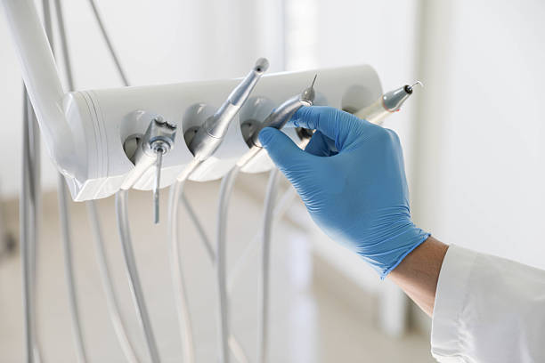 Professional Dental Implants technician working in Doña Ana County County, NM